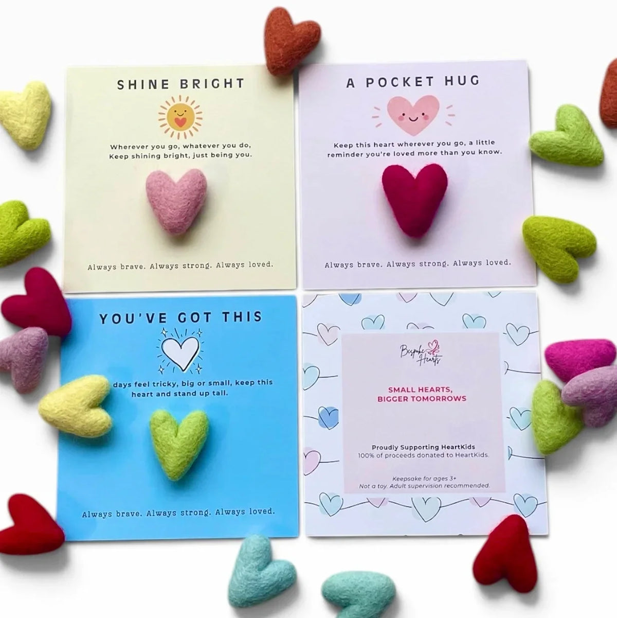 Four Bespoke Hearts Pocket Hug cards with colorful felt hearts for HeartKids fundraiser.