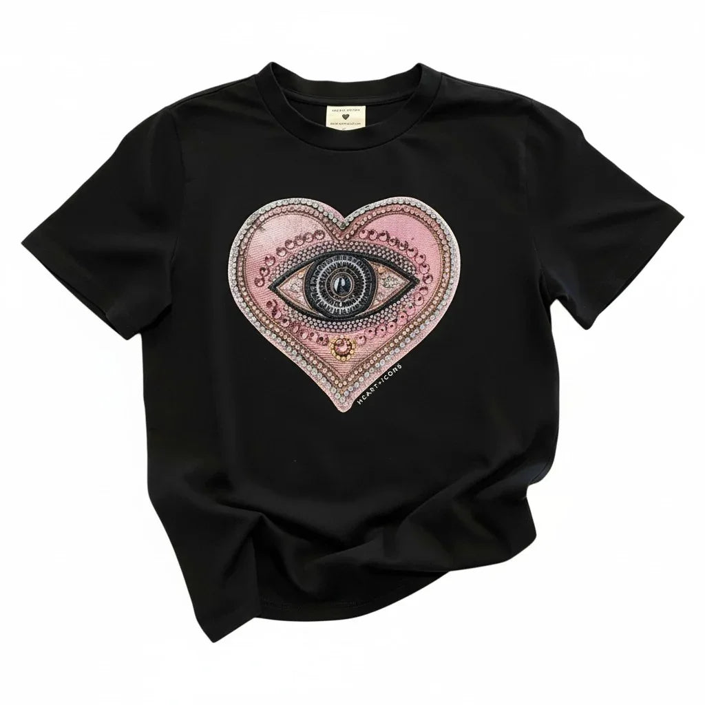Black Bespoke Hearts t-shirt featuring a pink jeweled heart with a central eye design.