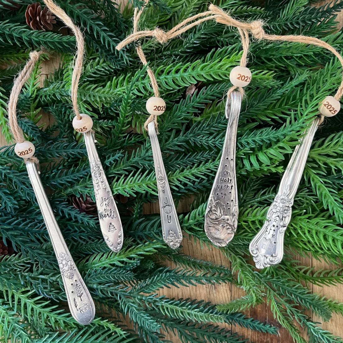 Silver spoon ornaments on a Christmas tree