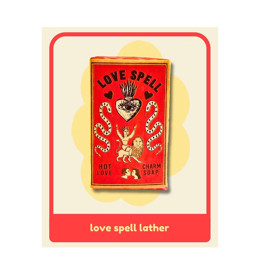 Red soap packaging with 'Love Spell' text on a beige background