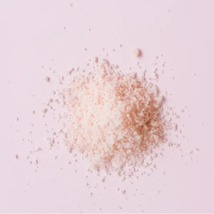 Pink Himalayan bath salts for romantic self-care, perfect for heart-themed gift sets